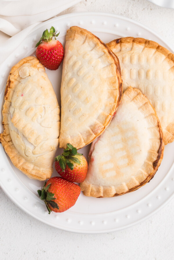 Strawberry Cream Cheese Hand Pies made in the Air Fryer on a white plate