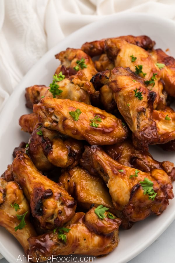 Air Fryer BBQ Chicken Wings on a white plate ready to serve.