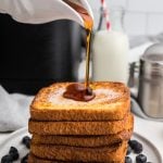 Syrup being poured on a stack of Air Fryer French Toast.