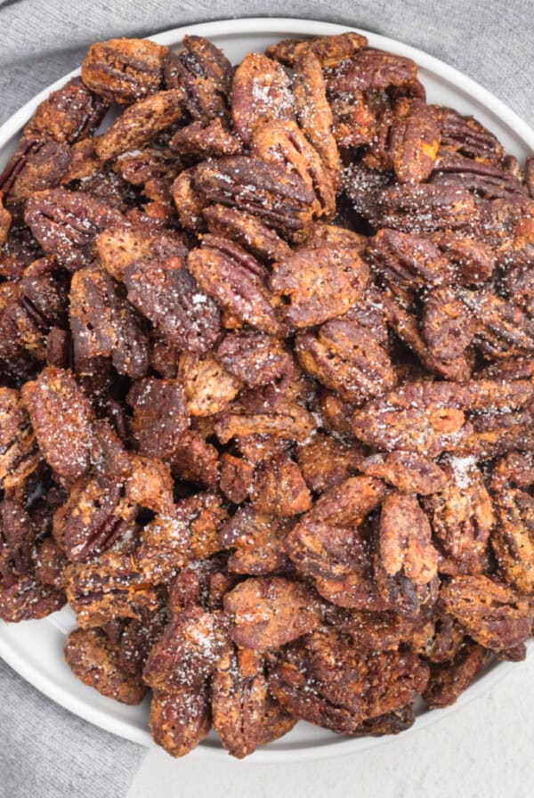 Air fried candied pecans in a bowl, ready to serve.