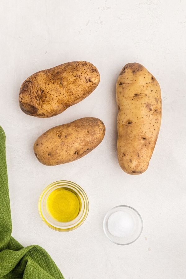 Ingredients to make potato chips in the air fryer, potato, olive oil, salt