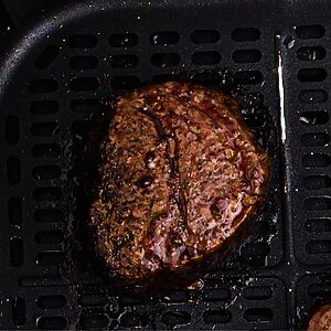 Juicy filet cooked in the air fryer basket.