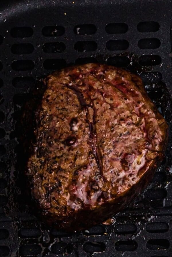 Juicy filet cooked in the air fryer basket.