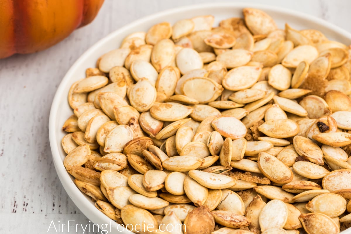 Close up photo of roasted pumpkin seeds made in the air fryer. 
