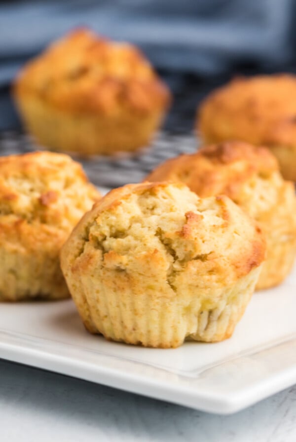 Banana Muffins on a white plate ready to eat.