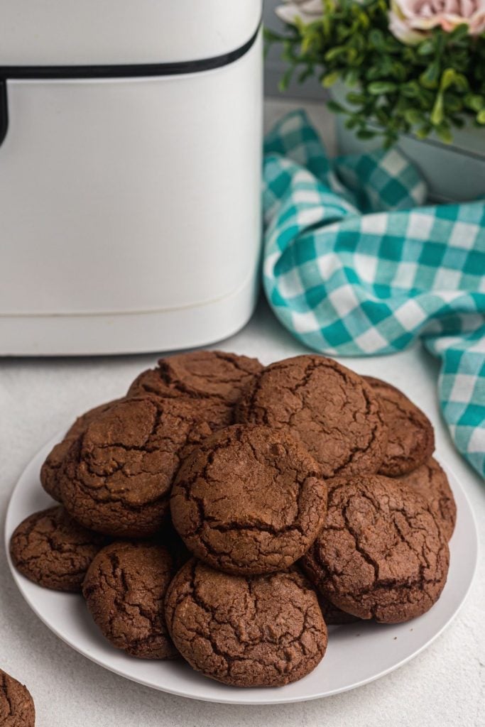 Soft fudgy brownie cookies made in the air fryer served on a white plate