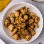 Air fryer chicken bites in a bowl ready to serve.