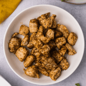 Air fryer chicken bites in a bowl ready to serve.