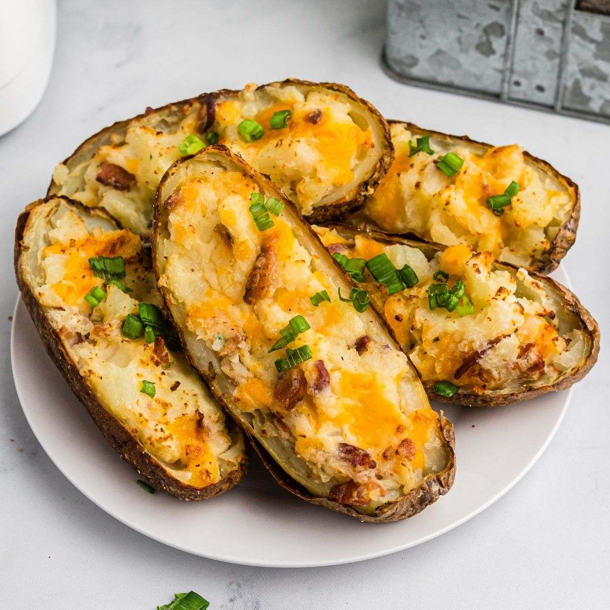 air fryer twice baked potatoes on a plate.