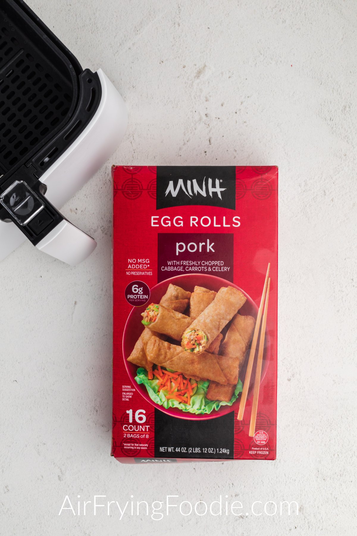 Minh frozen egg rolls in a box ready to be cooked in the air fryer. 