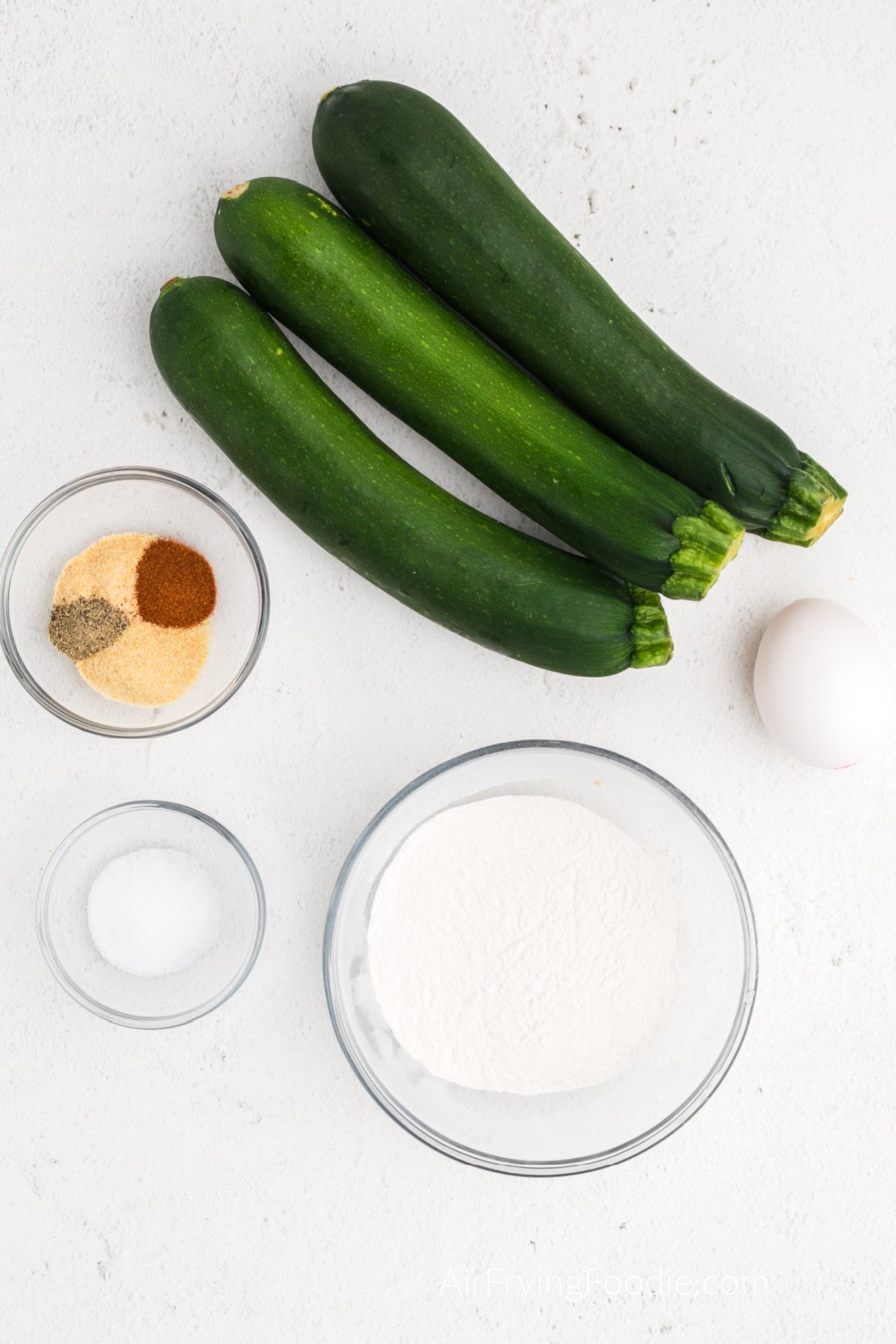 Ingredients needed to make Zucchini fritters in the air fryer. 