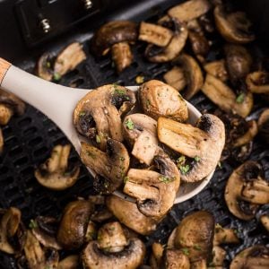 Juicy spoonful of mushrooms after being cooked in the air fryer