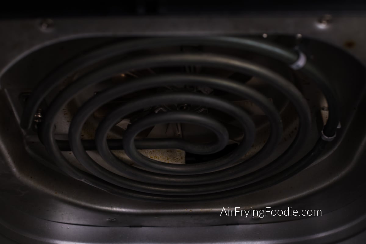 Close up photo of the inside heating element of the air fryer. 