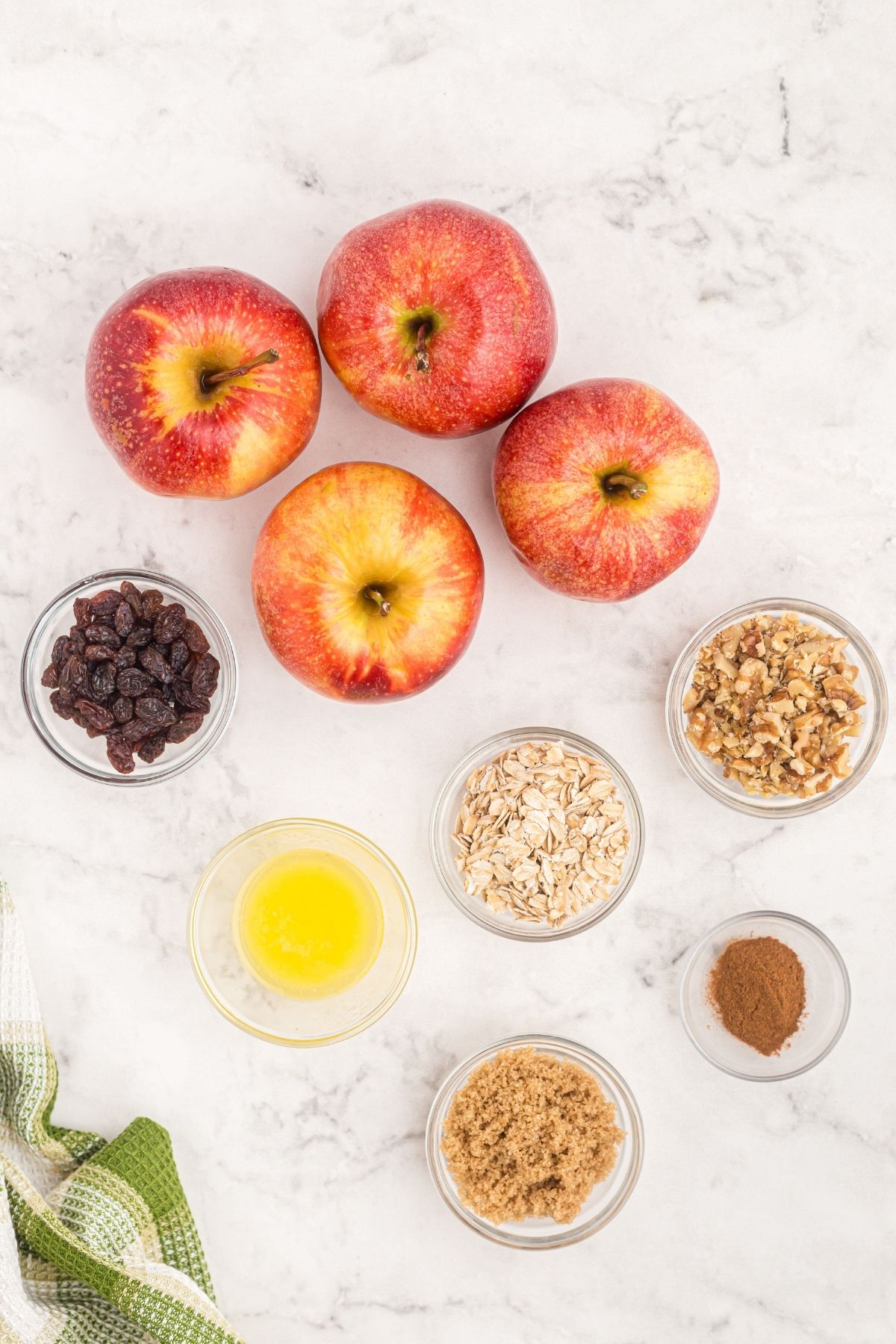 Apples and other ingredients needed to bake apples in the air fryer.