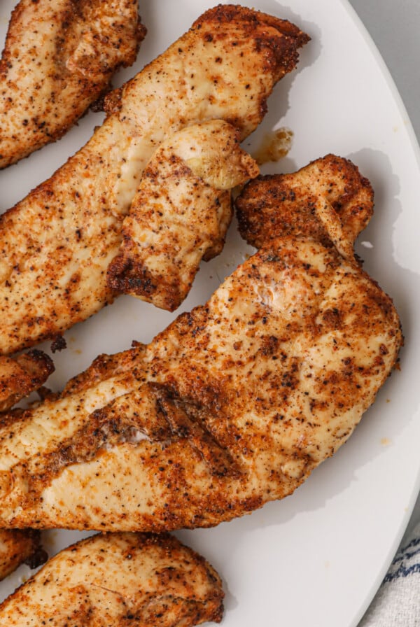 Close up photo of grilled chicken tenders made in the air fryer.