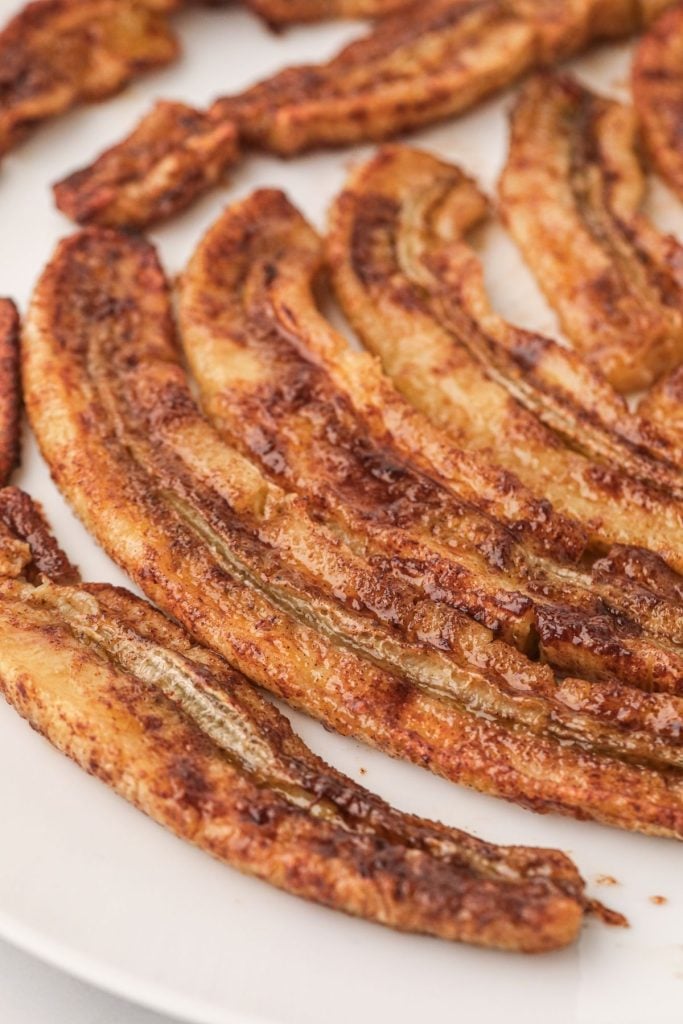 Golden sugar and cinnamon coated bananas after being cooked in the air fryer 