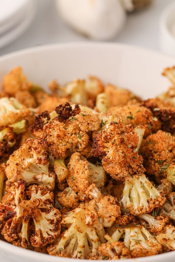 Golden crispy cauliflower after being cooked in the air fryer