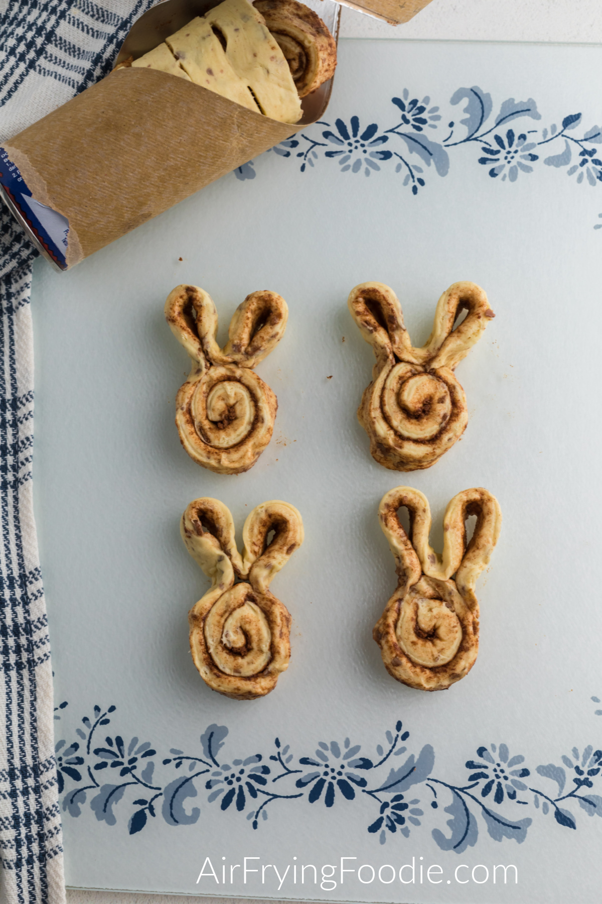 Cinnamon roll dough rolled into bunnies.