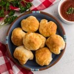 Air fryer mozzarella balls on a plate ready to serve.