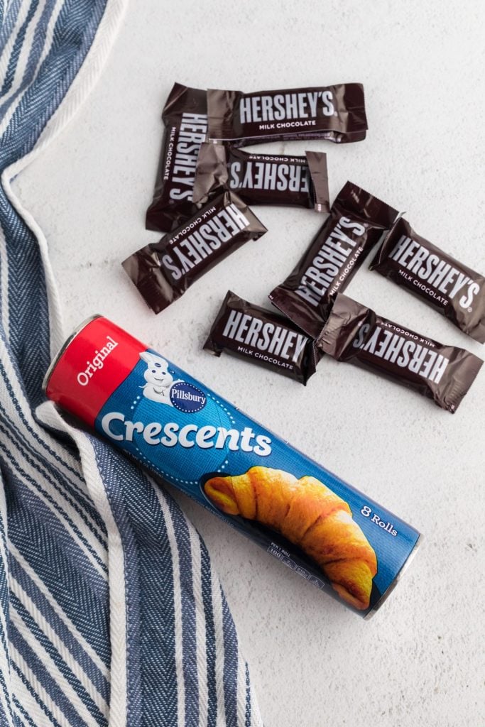 Ingredients needed to make croissants, including mini hershey chocolate bars