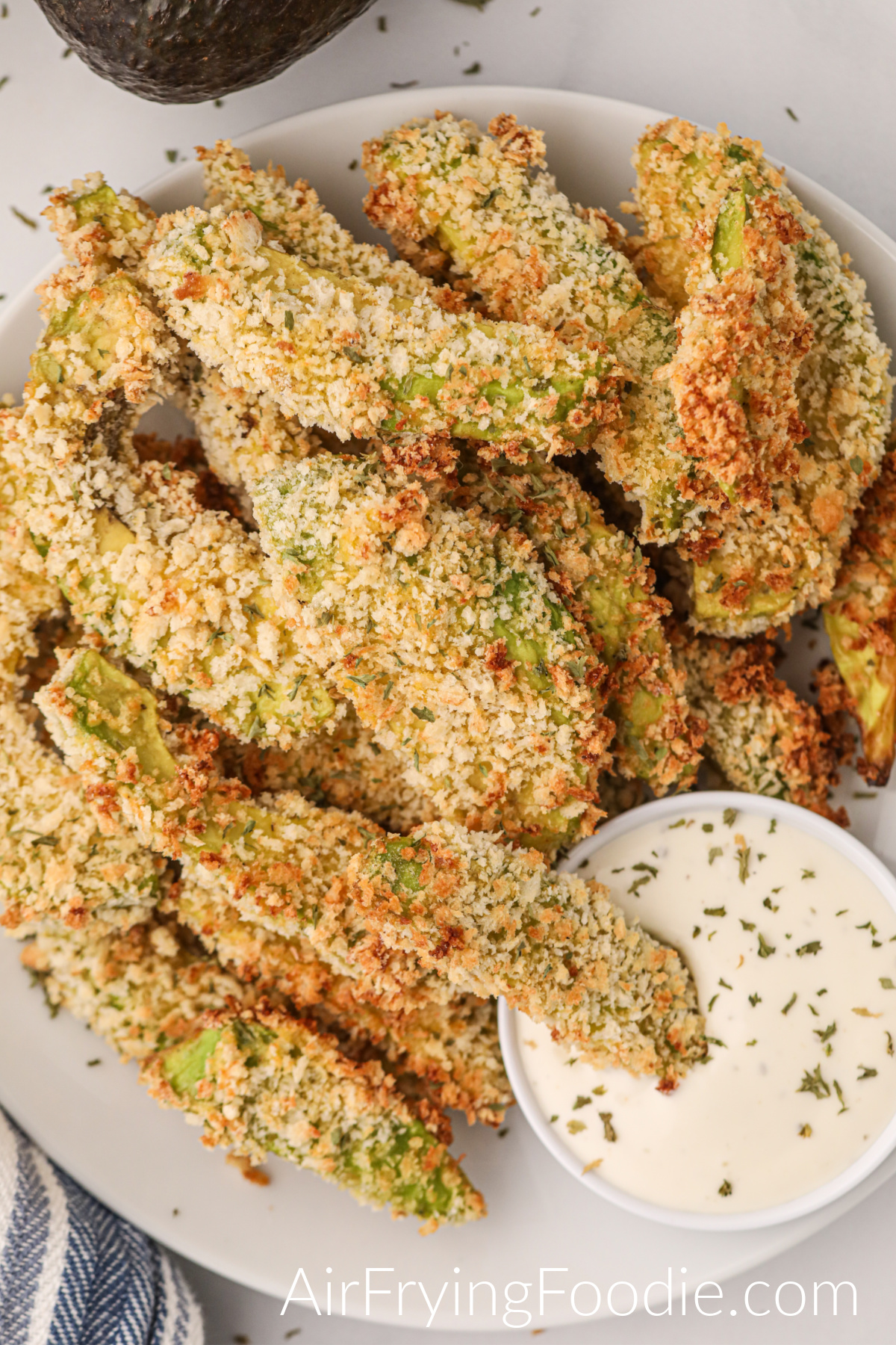 avocado fries with dipping sauce.
