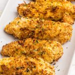 Golden crispy chicken coated with coconut flakes and parsley