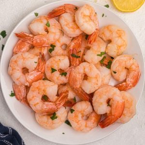 Air fried shrimp on a plate and ready to serve.