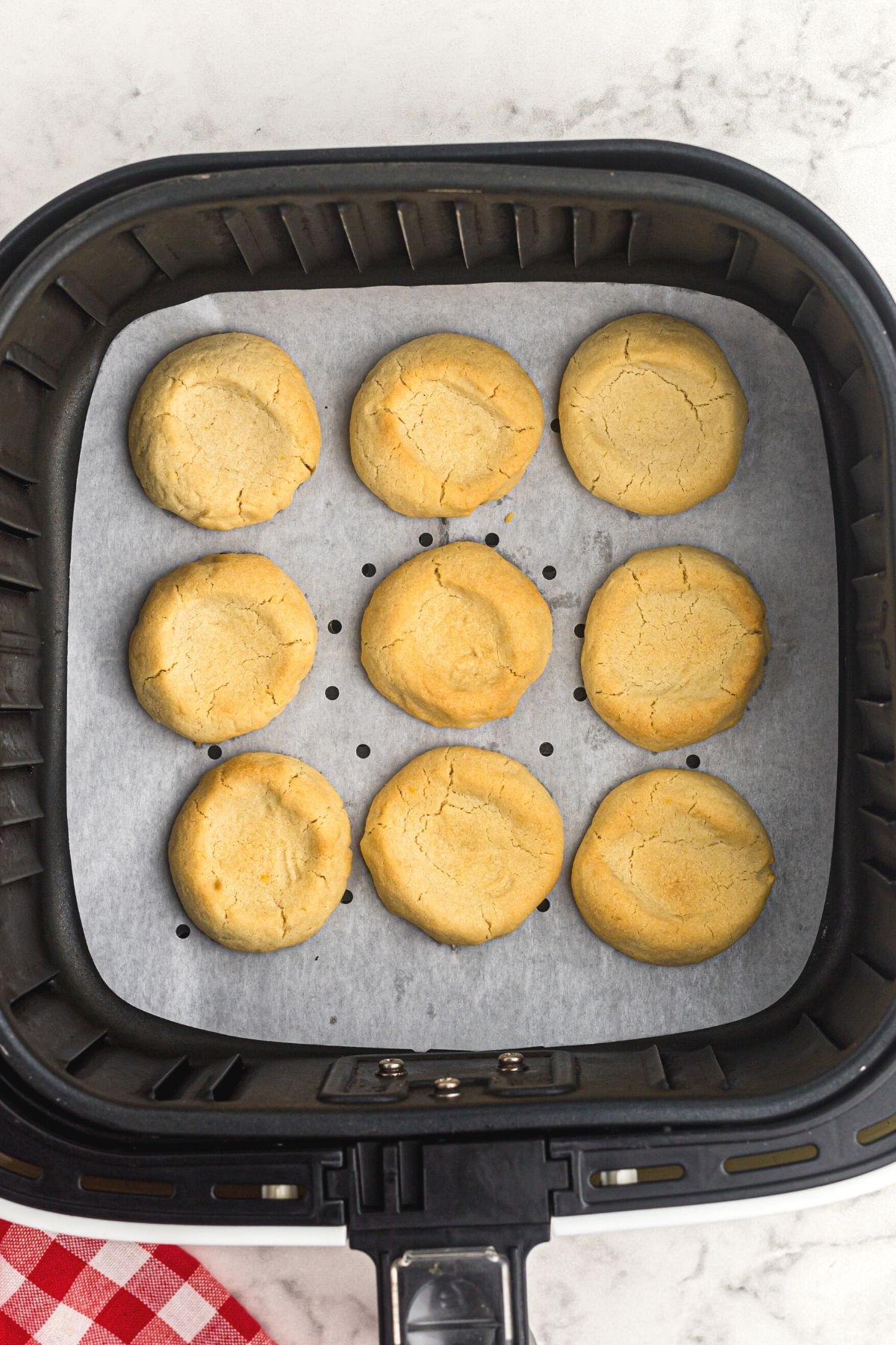 Golden cookies in the air fryer basket