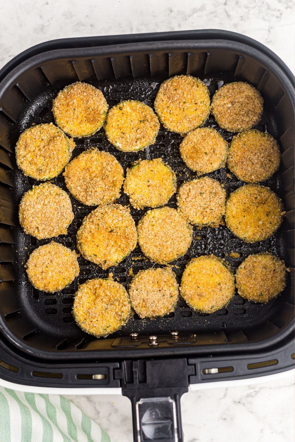 coated zucchini chips before cooking in air fryer