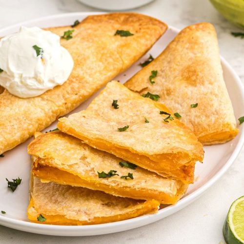 Golden crispy tortillas filled with cheese to make quesadillas