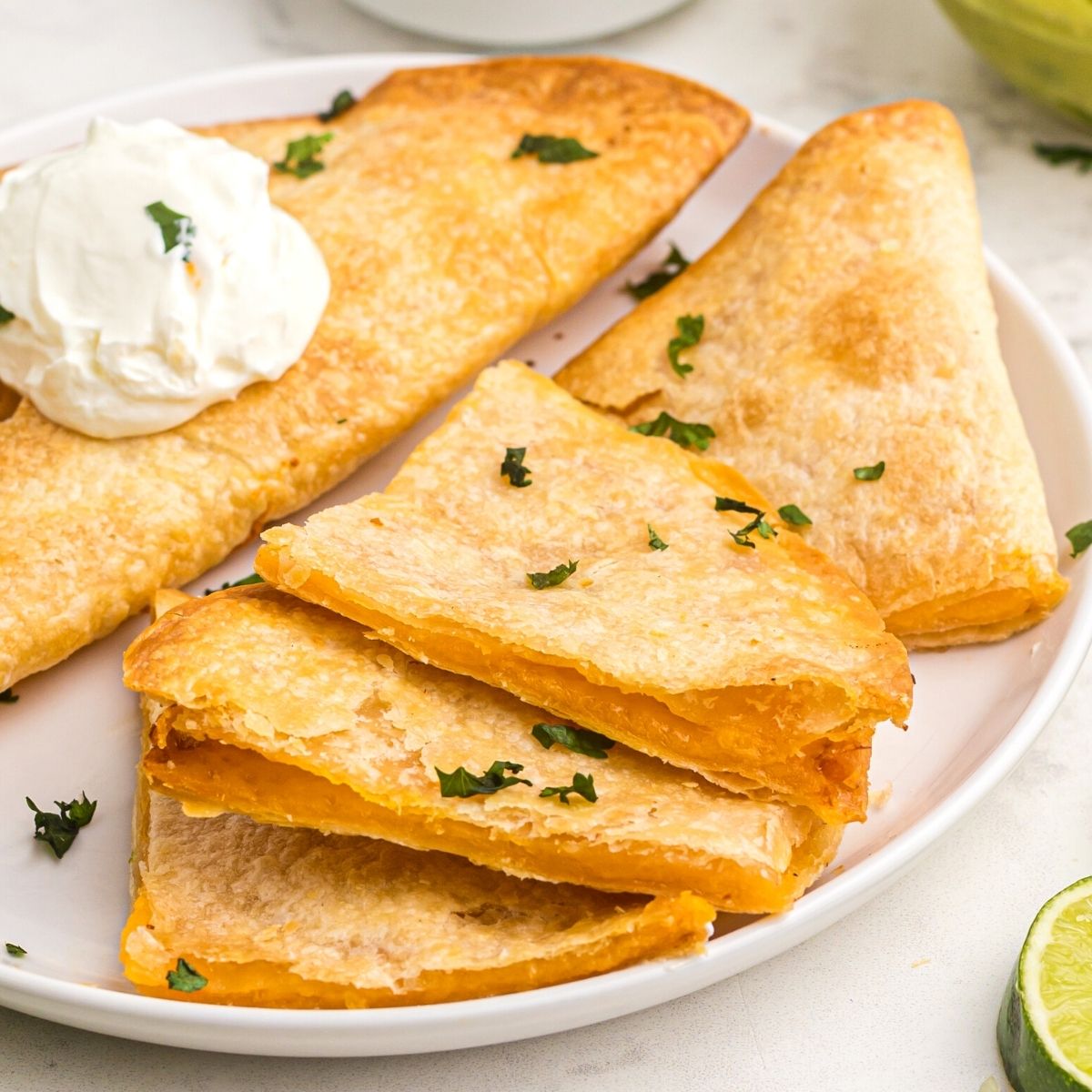 Golden crispy tortillas filled with cheese to make quesadillas