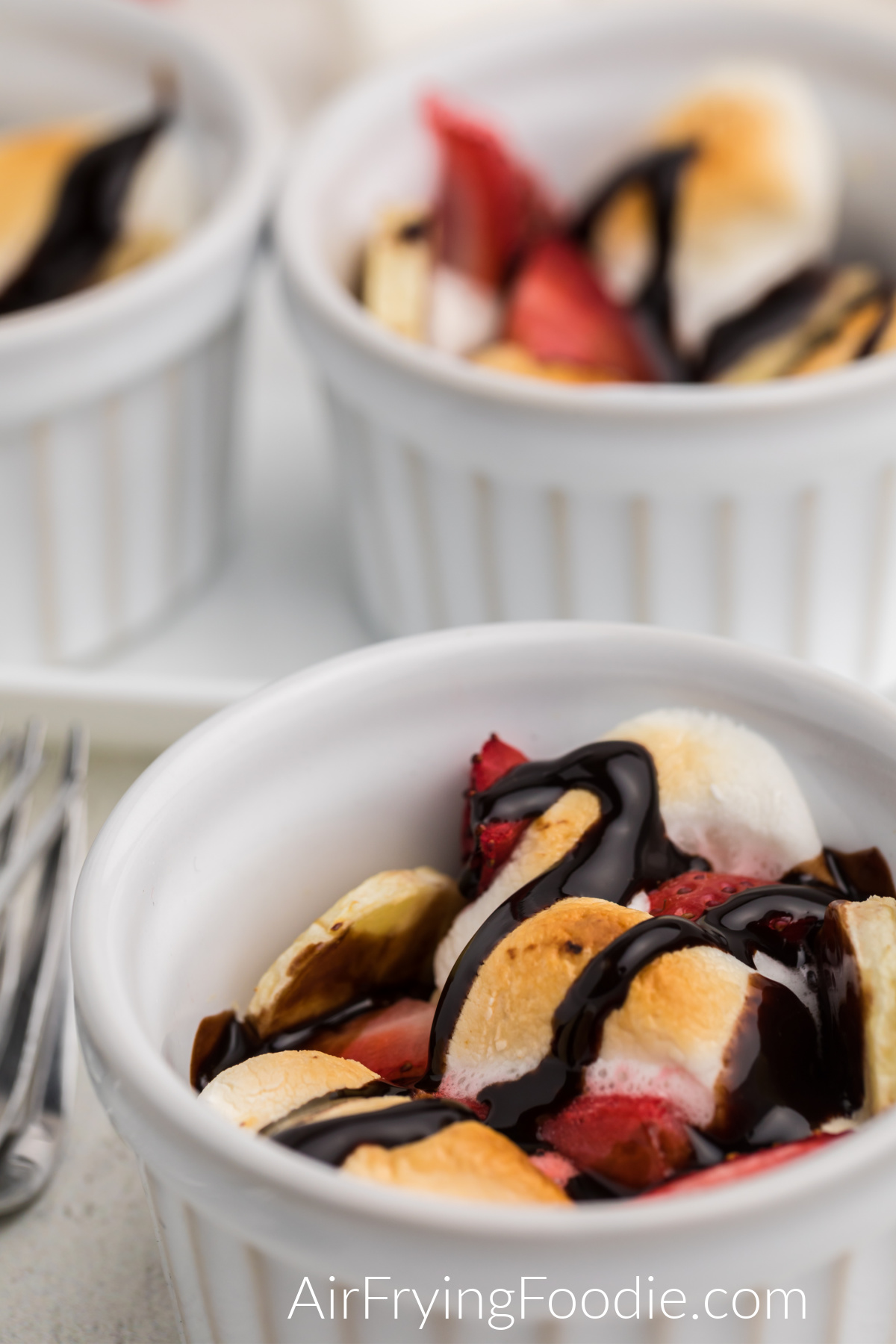 Air fried strawberry banana bowls with chocolate topping. 