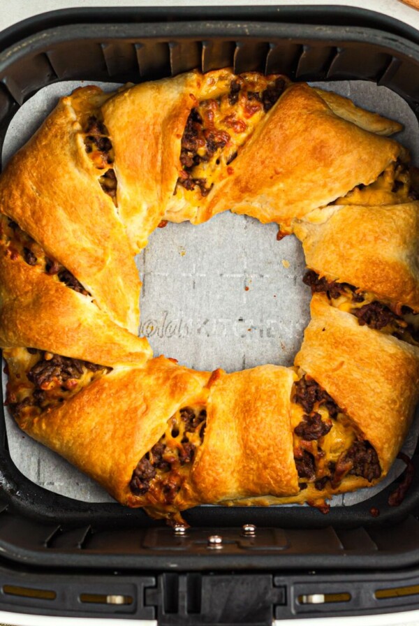 Golden crescent rolls wrapped around taco meat and seasonings.