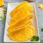 golden crispy shells on a white plate