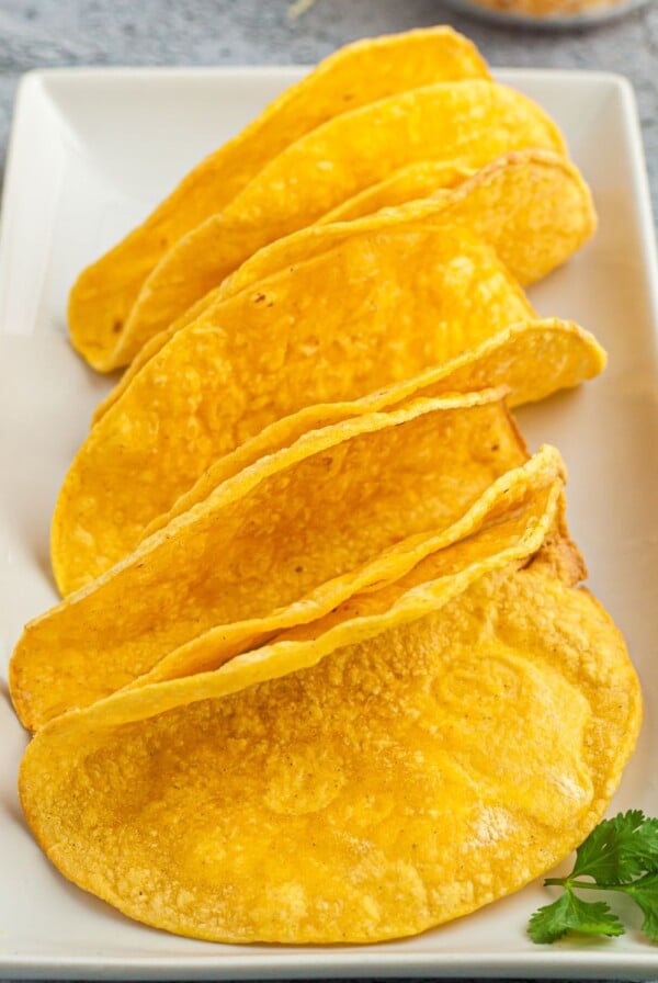 golden crispy shells on a white plate