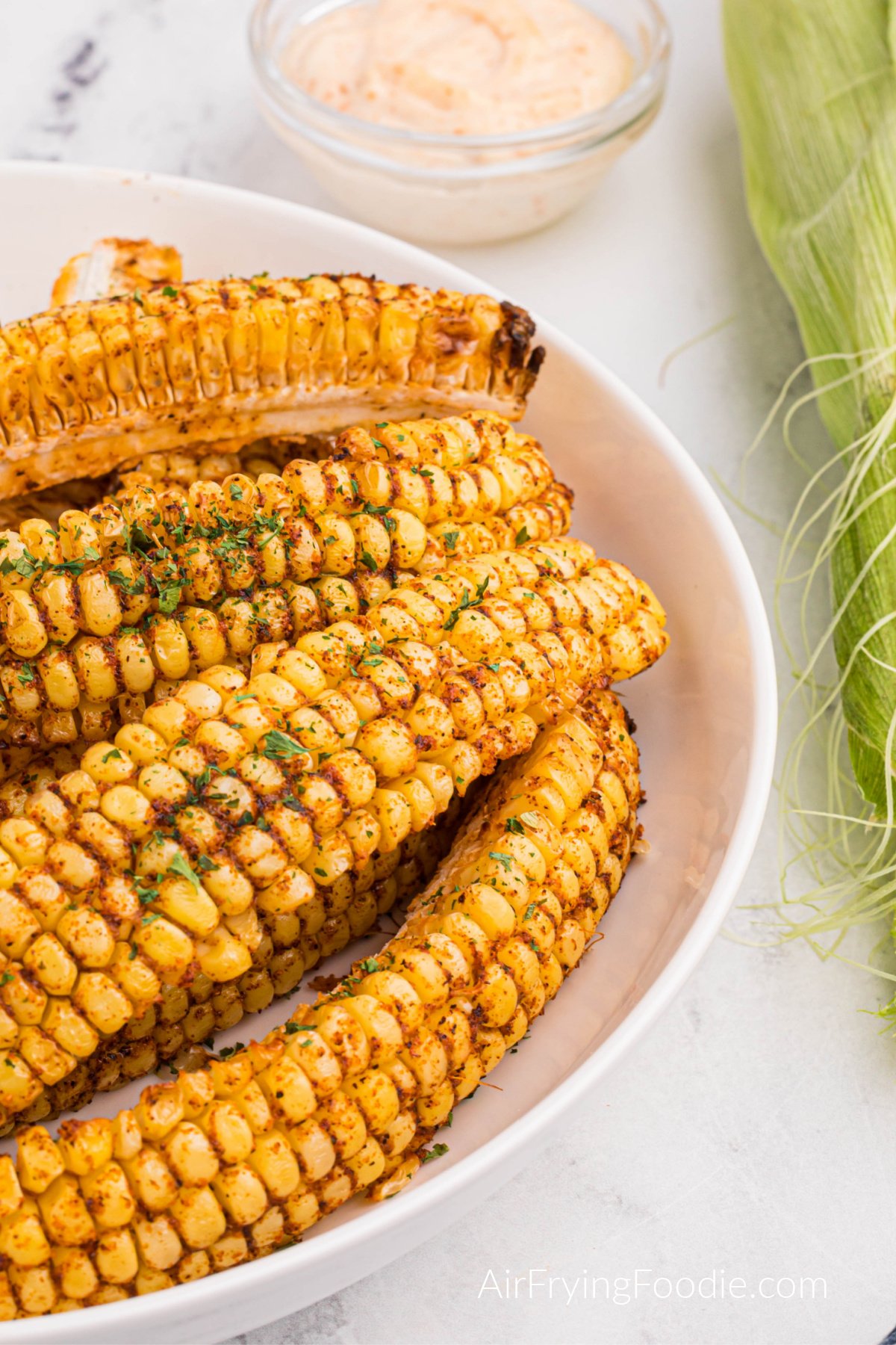 Air fryer corn ribs on a plate, ready to eat. 
