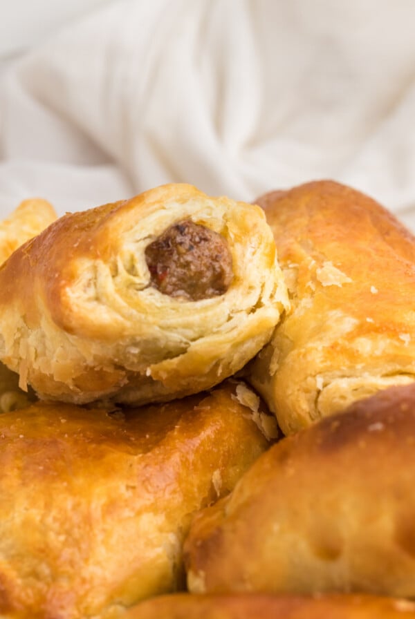 Close up shot of air fryer sausage rolls ready to serve.