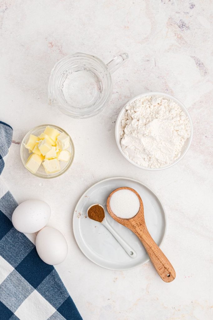 Measured churro  ingredients on a marble table