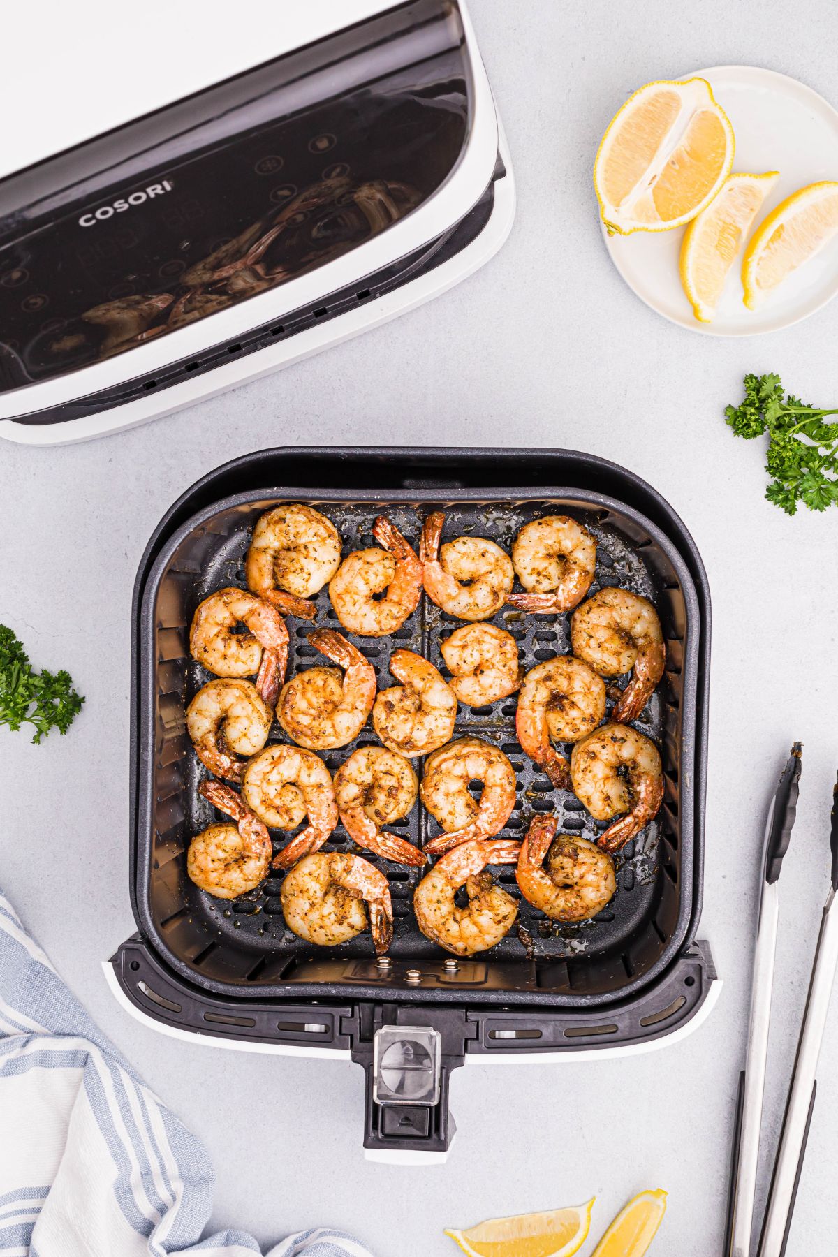 Shrimp cooked in the air fryer on a white marble table