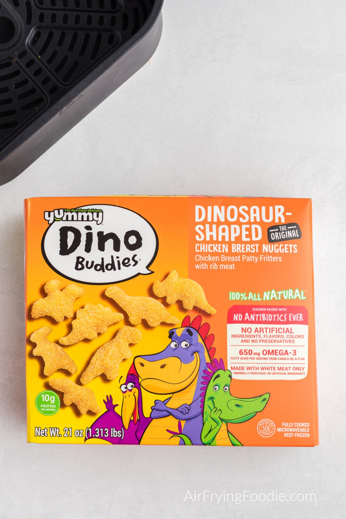 A box of Yummy brand dinosaur chicken nuggets. 