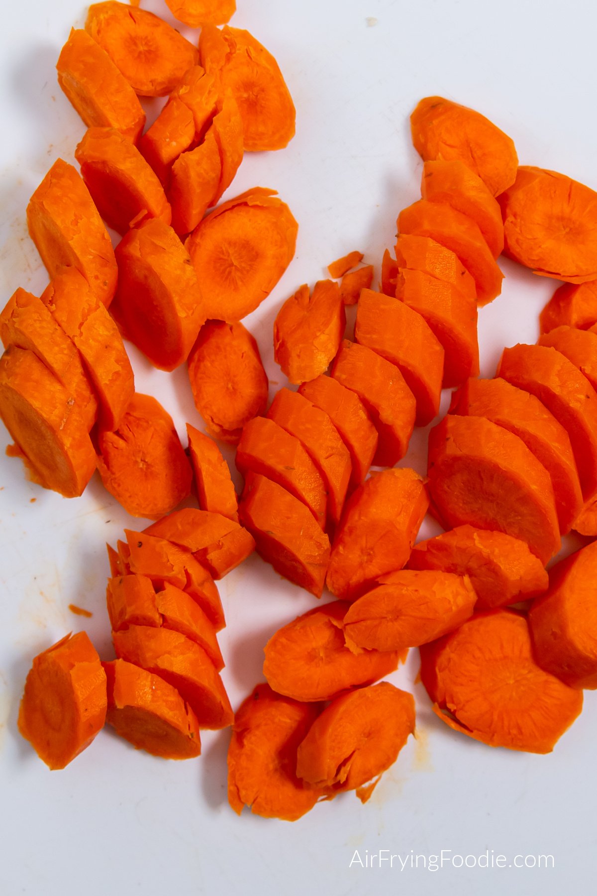 Carrots sliced into angles pieces.