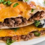 Air fryer Mexican Pizza close up photo of slices of pizza on a plate and ready to serve.