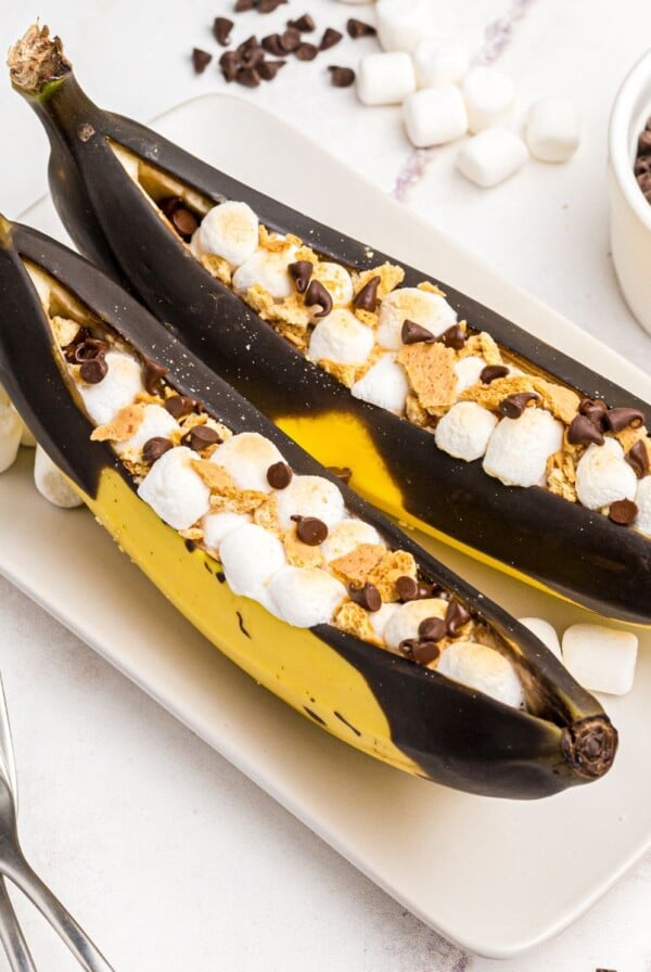 Bananas sliced open and stuffed with marshmallows and chocolate chips, then air fried.