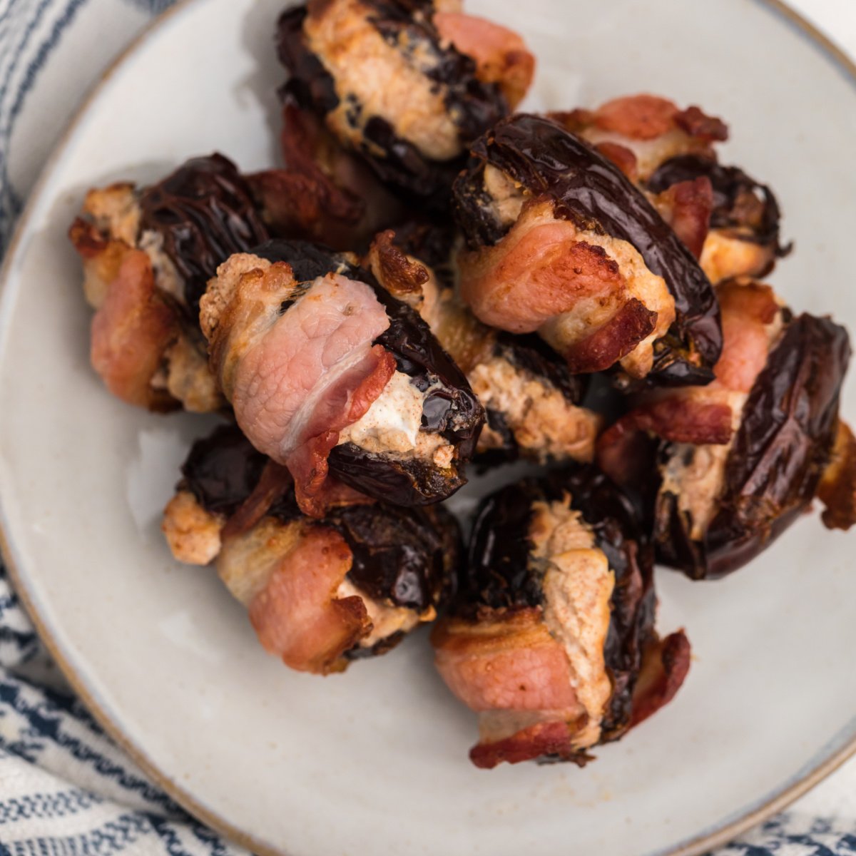 Cream cheese stuffed air fryer bacon wrapped dates.