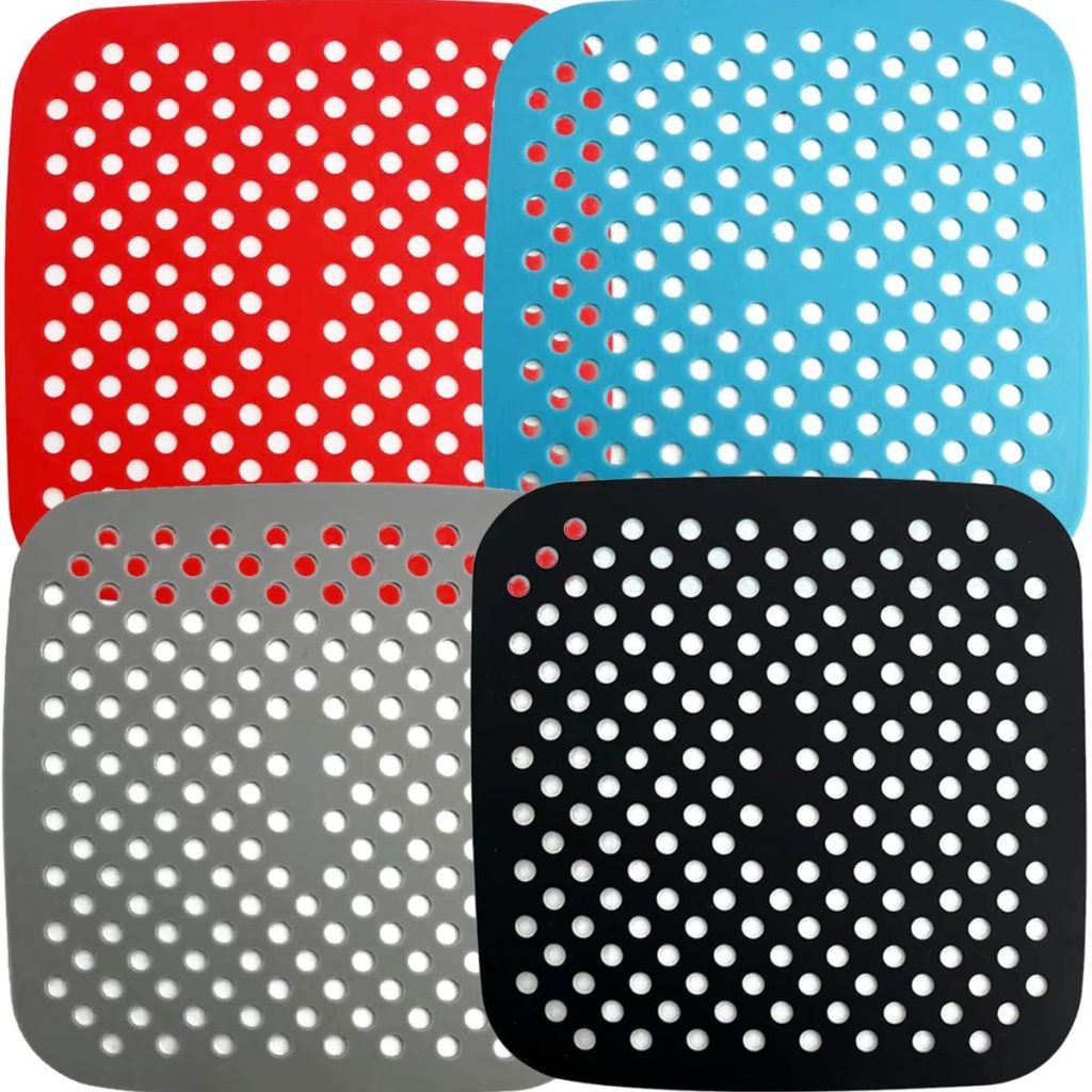 Red, blue, black, and gray square air fryer silicone liners. 