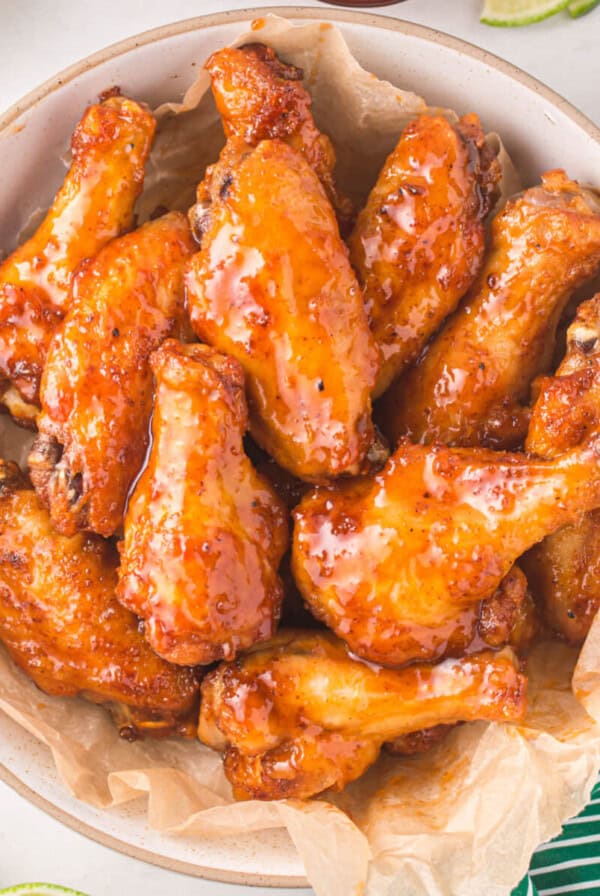 Reheated chicken wings in the air fryer and served in a bowl.