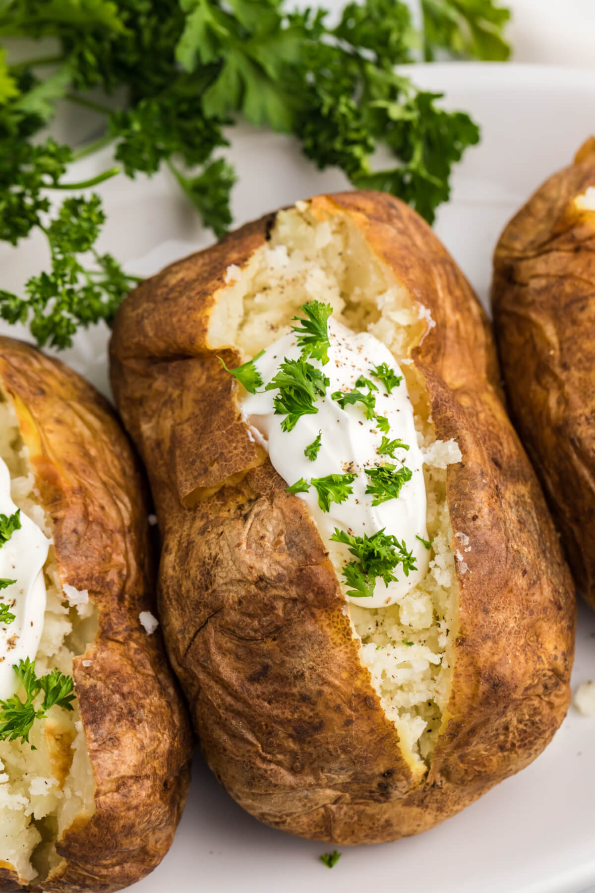 reheated baked potato on a plate.