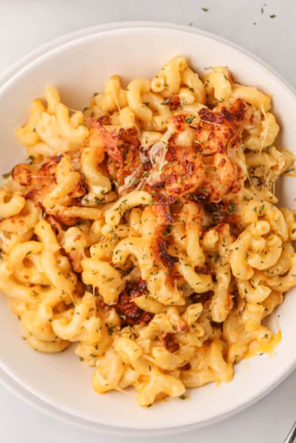 air fried mac and cheese in a white bowl, ready to serve.