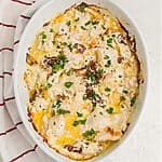 overhead photo of sun dried chicken in a casserole dish. made in the air fryer.