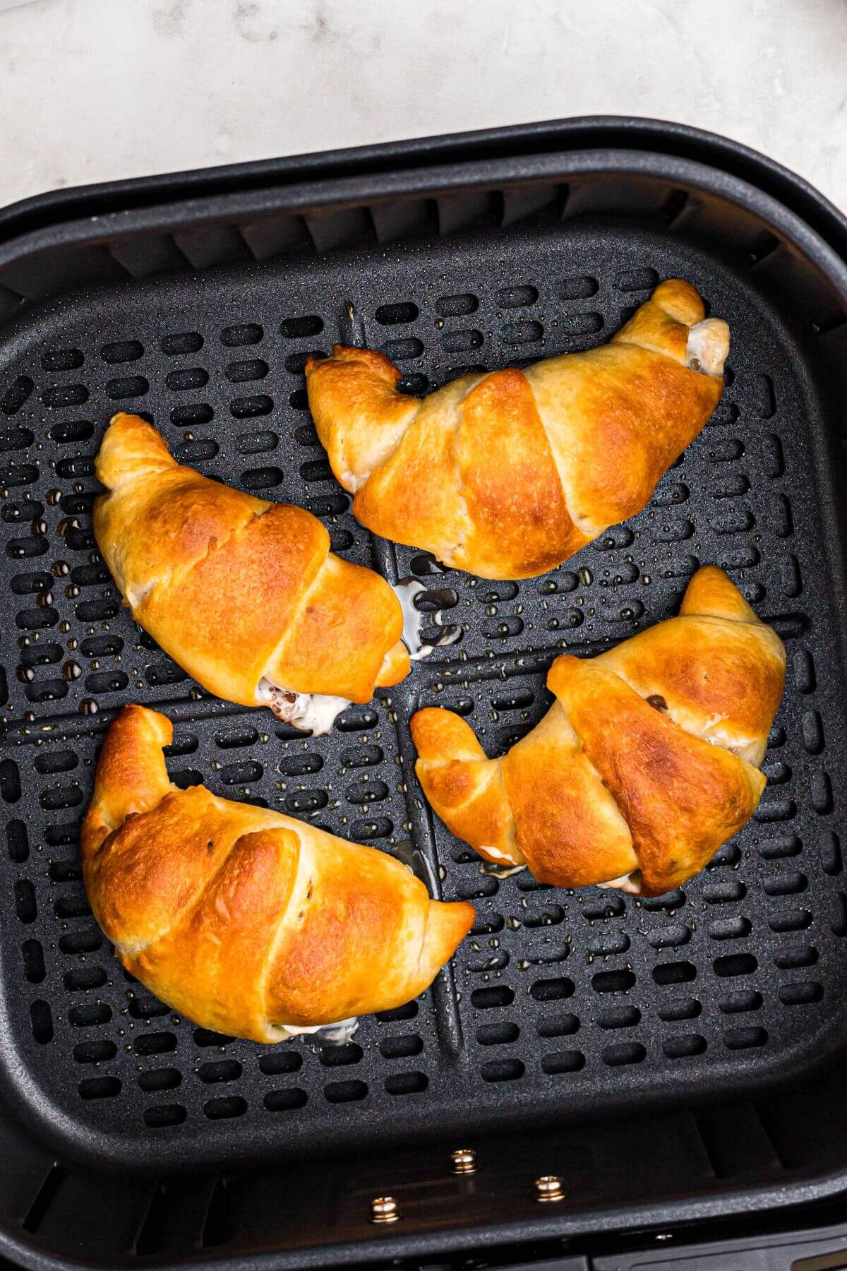 Golden flaky crescents filled with gooey marshmallows and mini chocolate chips. 